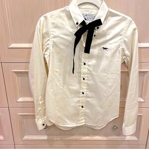 Maison Kitsuni button down shirt with bow.